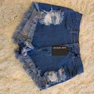 Fashion nova. New. High waist denim shorts.